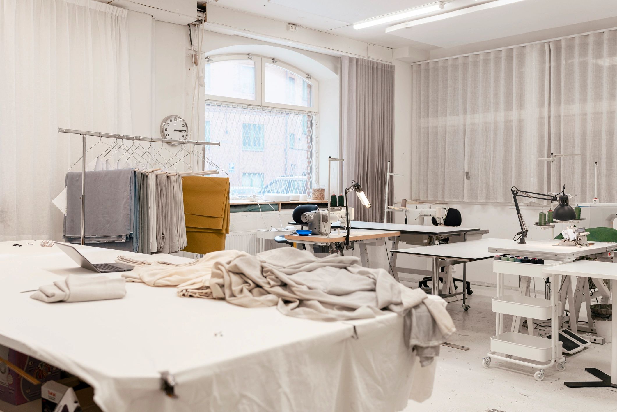 Bright craft studio with worktables and materials